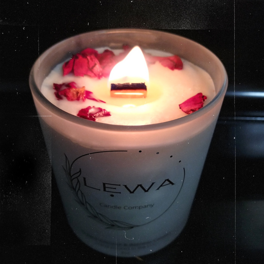 Close-up of lit Authentic Organic Rose Scented Candle, showcasing the warm glow and eco-friendly beeswax and coconut wax blend.